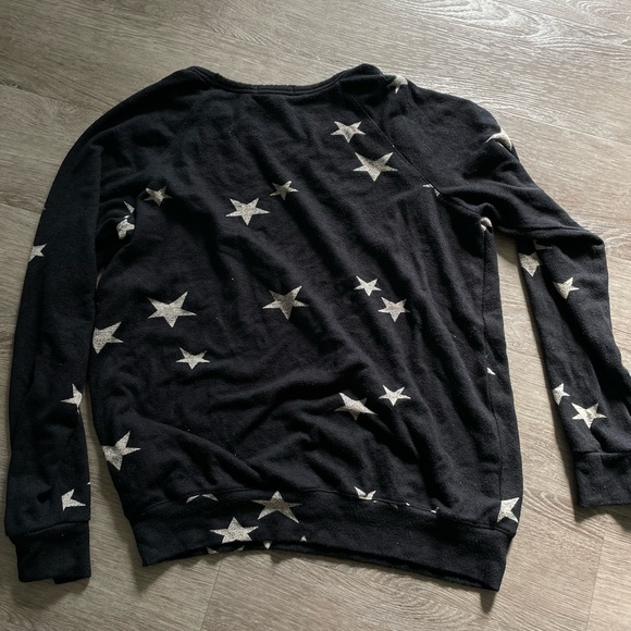 Longer black sweater with white stars. - Picture 4 of 6